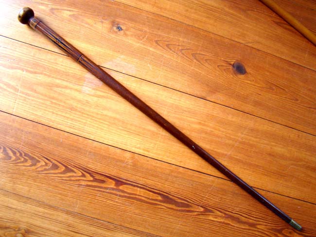 A fine mid 19th century carved and inlaid Sea Captain's cane with octagonal shaft — image 3